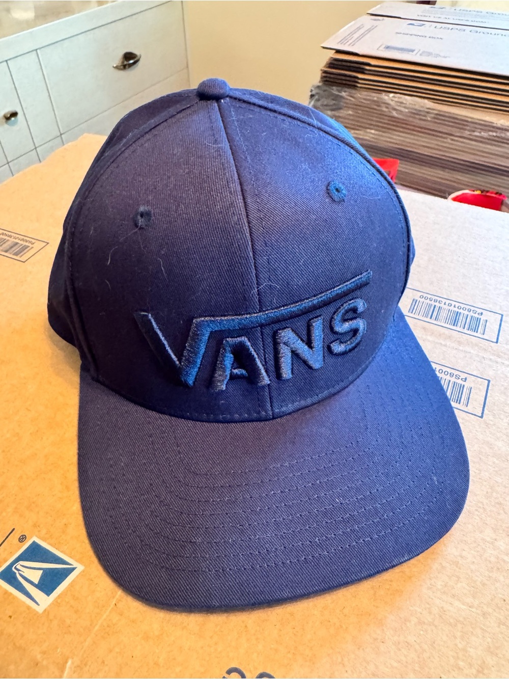 Van’s baseball cap